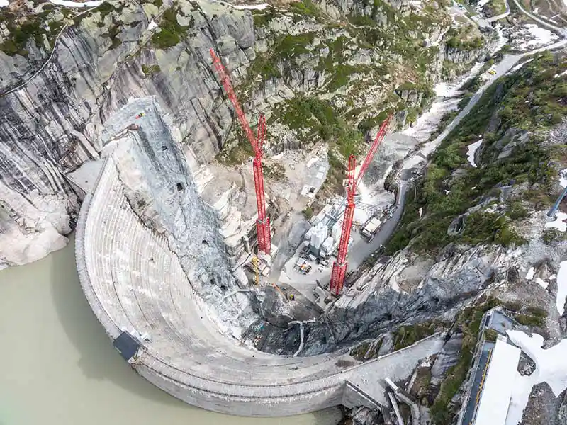 Two WOLFF 1250 B cranes successfully installed on the new XXL TV 60 Tower Sections at the Swiss Grimsel Pass