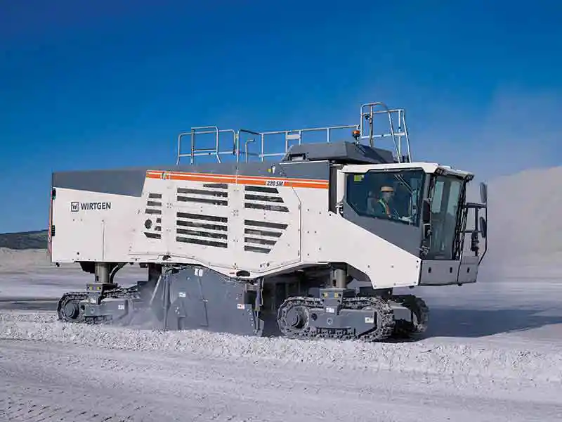 The WIRTGEN 220 SM: Surface Miner for Raw Material Extraction & Routing