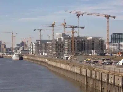 25 Liebherr Tower Cranes at work on the Überseequartier District in Hamburg's HafenCity area