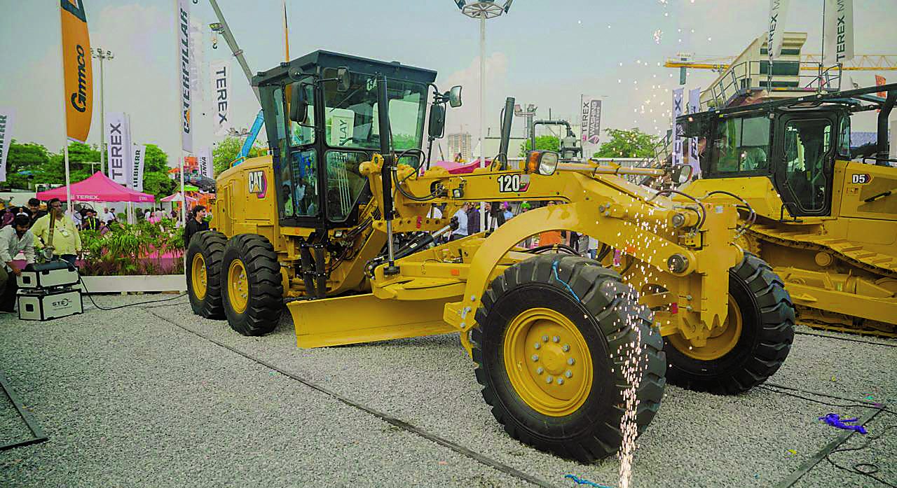 Cat 120 GC motor grader on display