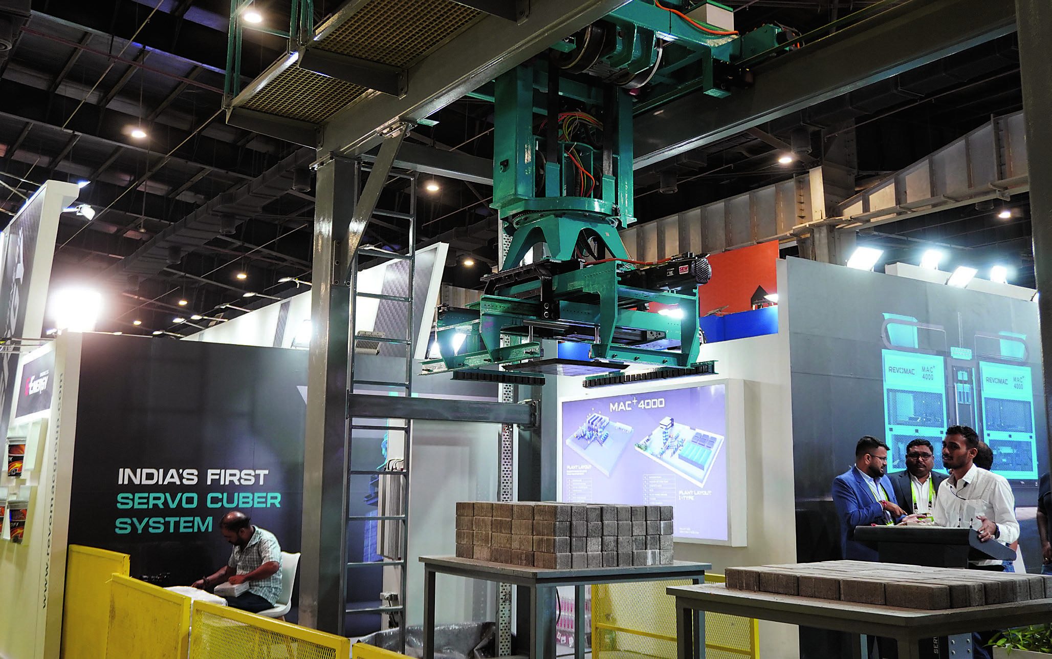 Jigar Patel, Director, Revomac Industries, with automated block-making machinery