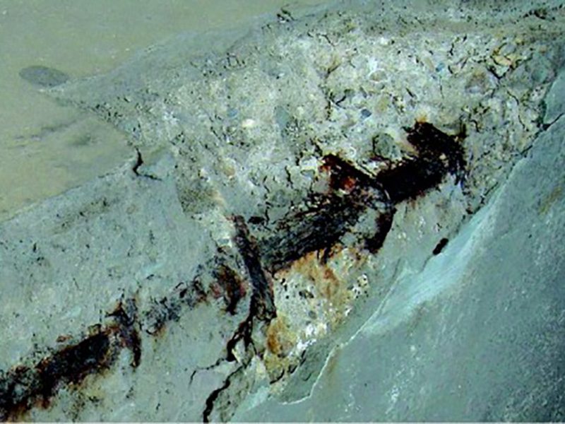 Re-alkalization of Carbonated Reinforced Cement Concrete Members