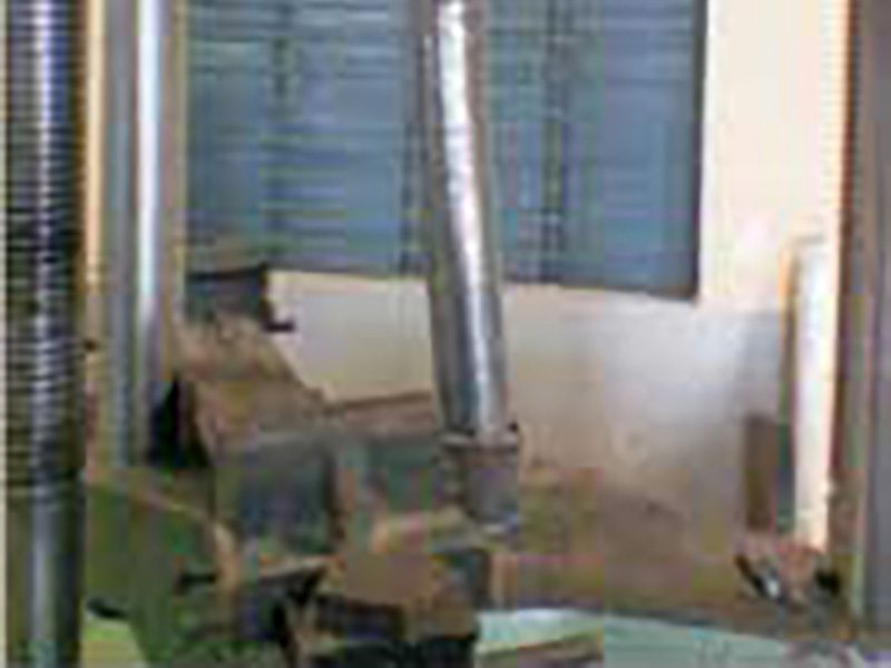Experimental Behavior of Axially Loaded Slender Hollow Steel Columns in-filled with Rubber Concrete