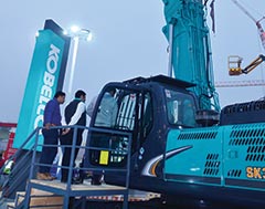 Kobelco displays wide range of machines; focuses on mining, special attachments, extra care customer support