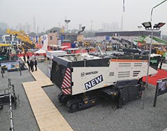 Wirtgen showcases half-meter milling machine, next-gen surface miner, mobile power feeder, new technologies